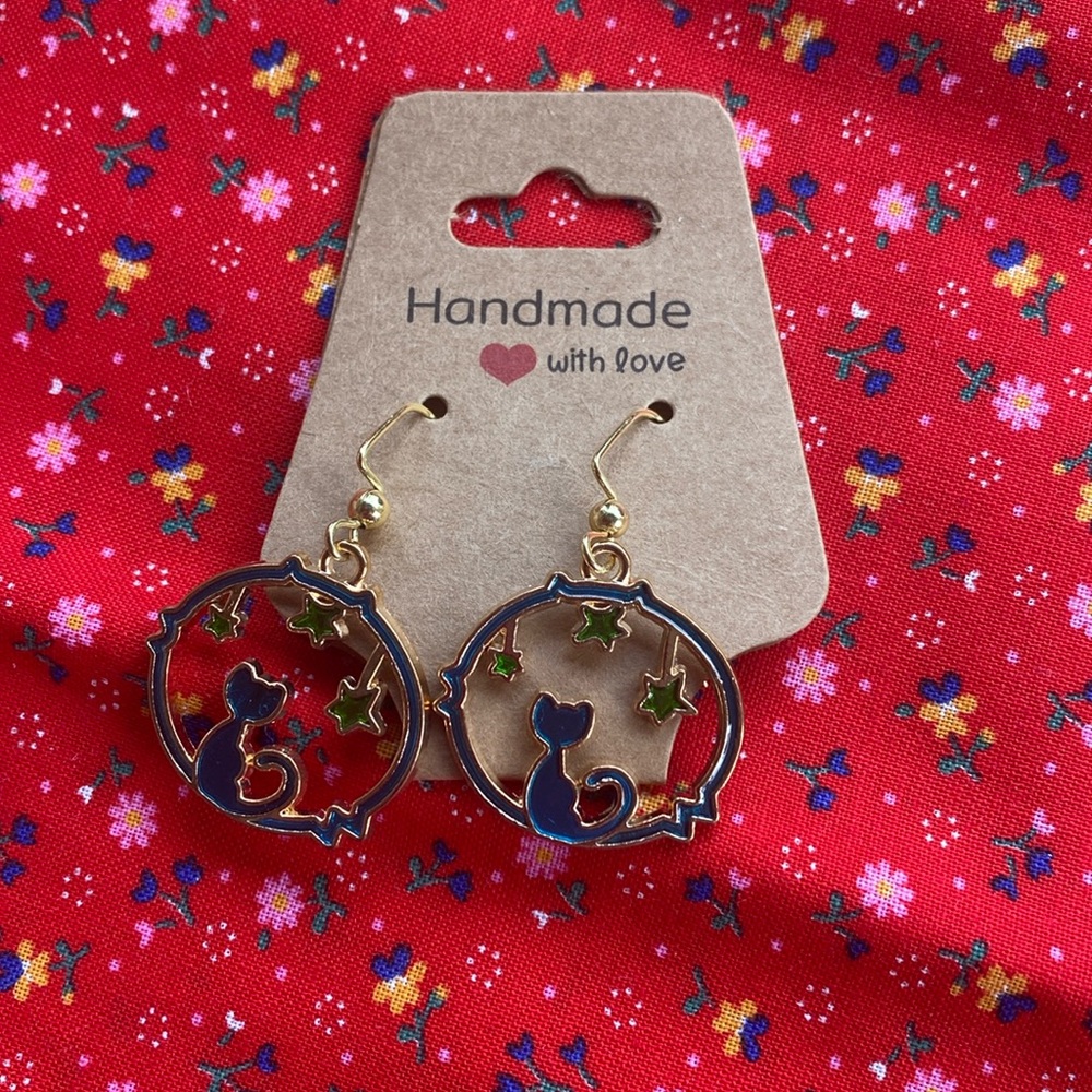 Cat under the stars handmade earrings. 
3 for $20.